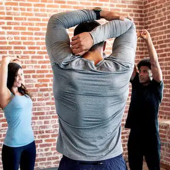 Benefits of Chiropractic Care for Fibromyalgia : group doing a stretch with  improved joint flexibility and joint mobility