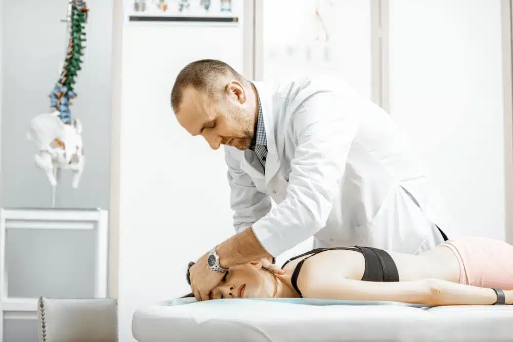 woman receiving chiropractic treatment