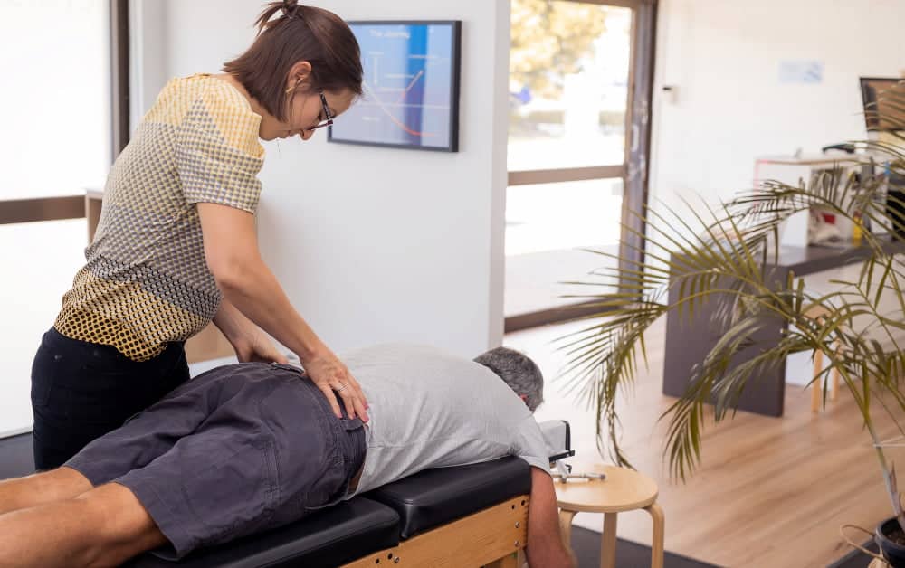 senior man receiving chiropractic treatment