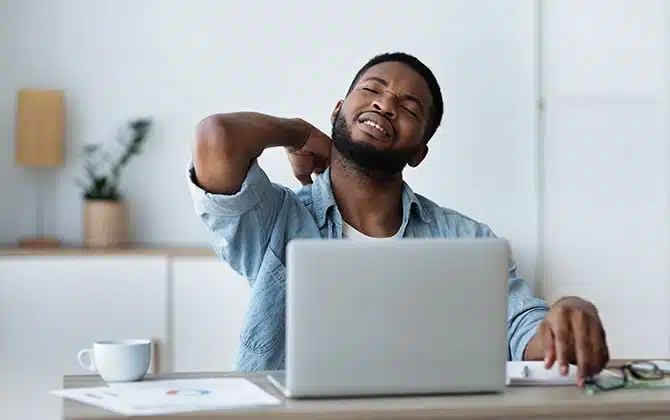 office worker with a shoulder pain
