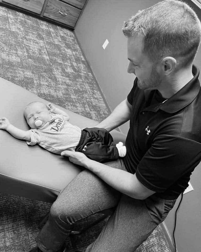 Young baby boy cries feeling uncomfortable suffering from Digestive Issues | pediatric chiropractic care in columbus