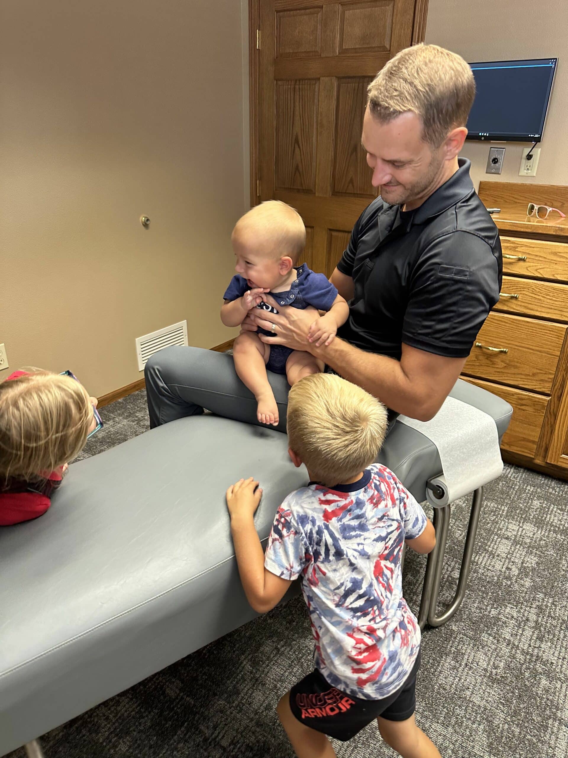 Mother and daughter having interaction with their pediatric chiropractic care in columbus