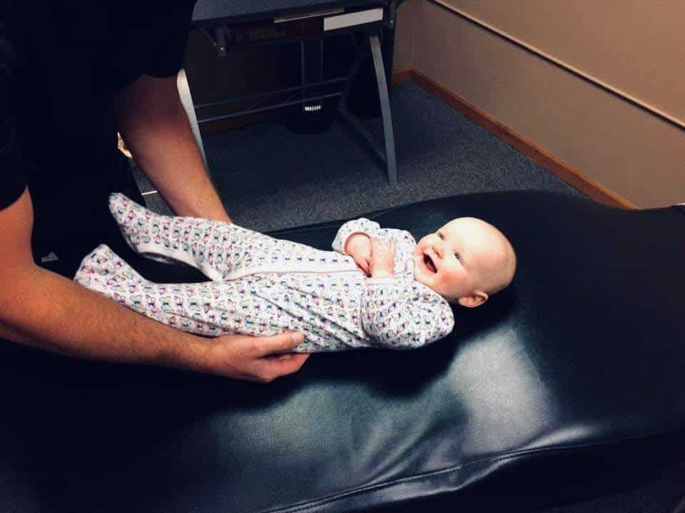 Baby receiving pediatric chiropractic care in columbus