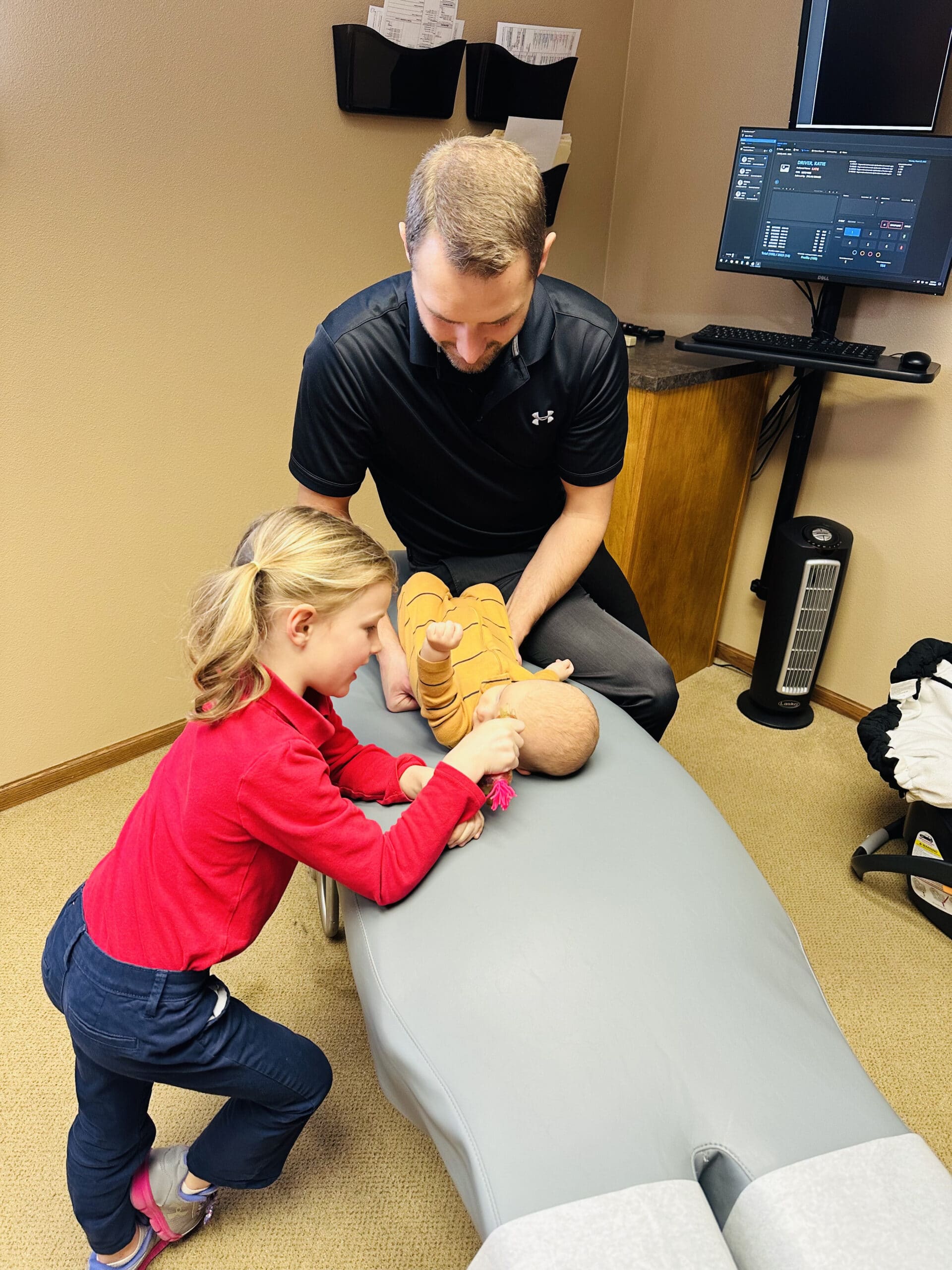 pediatric chiropractic care in Columbus caring for a young patient.